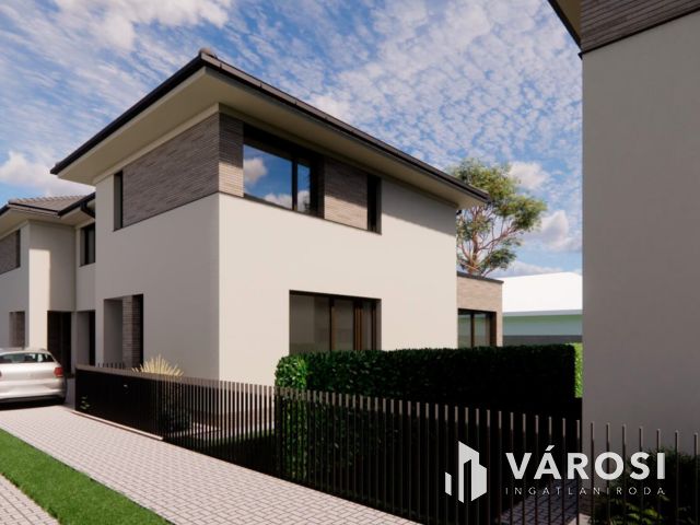 Debrecen kedvelt, csendes kertvárosi részén ELADÓ IKERHÁZ